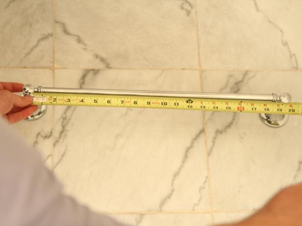 Measure from center post to center post on the towel rack.