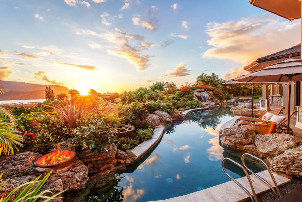 Picturesque Pool and Patio With Lush Tropical Plants Picturesque Pool and Patio With Lush Tropical Plants