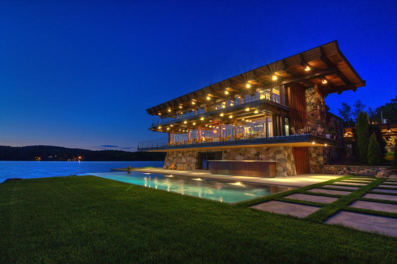 Contemporary Waterfront Home With Swimming Pool at Night