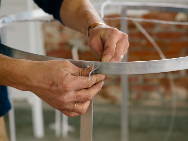 Loop wire through lamp base to make a pendant light
