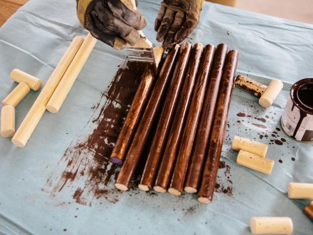 Stain wood dowels to make a midcentury modern coffee table.