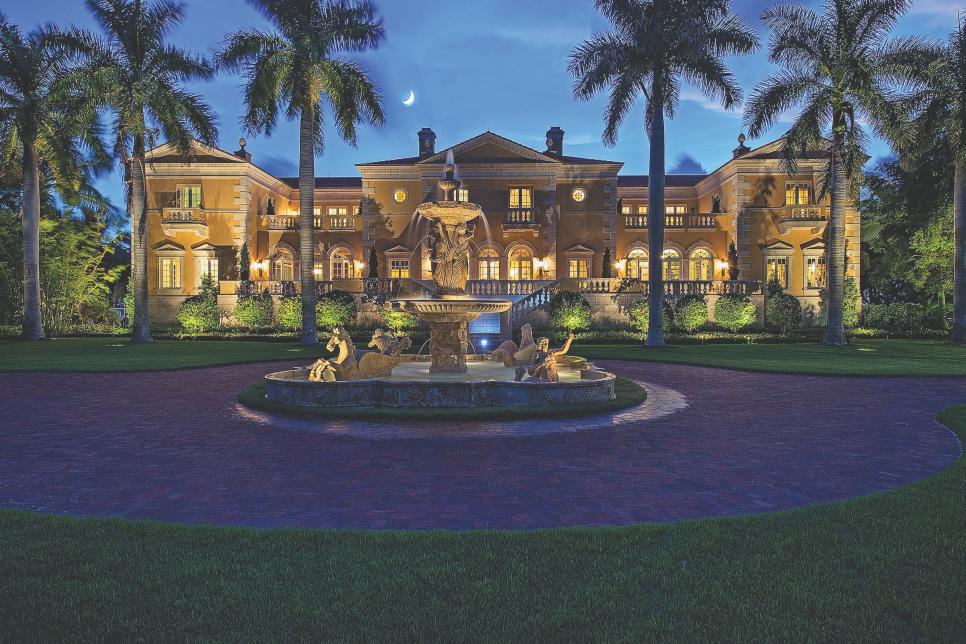 Yellow Mansion With Water Fountain and Tropical Landscape