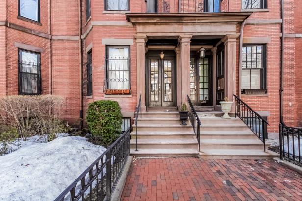 Duplex Home with Red Brick Exterior and French Door Entrance Duplex Home with Red Brick Exterior and French Door Entrance