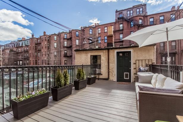 Spacious Shared Deck With Brown Wicker Outdoor Sofa Spacious Shared Deck With Brown Wicker Outdoor Sofa