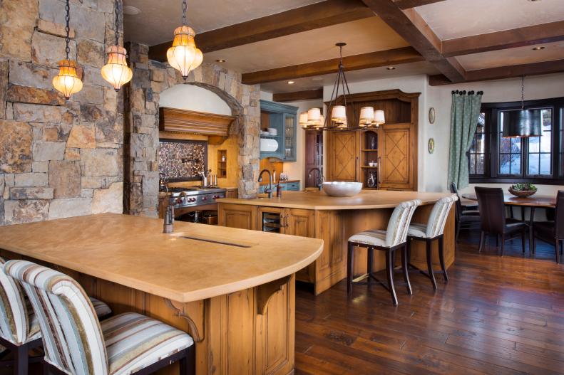Kitchen With Stone Accent Wall and Dining Area