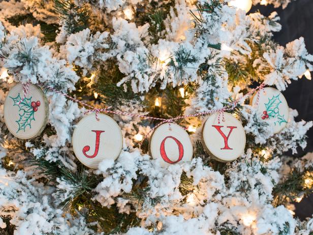 Wood slices are definitely a trend in decorating. This version of a wood slice banner adds color with permanent markers and is easy for anyone to make with the assistance of transfer paper.