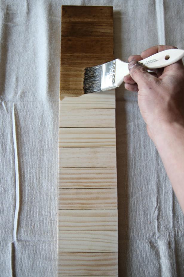 Apply oak stain to wood to make rustic-style house numbers.