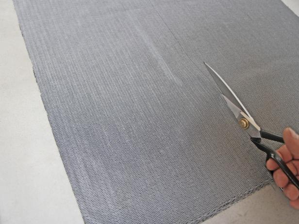 Cut fusing with fabric scissors to make a leather iPad case.