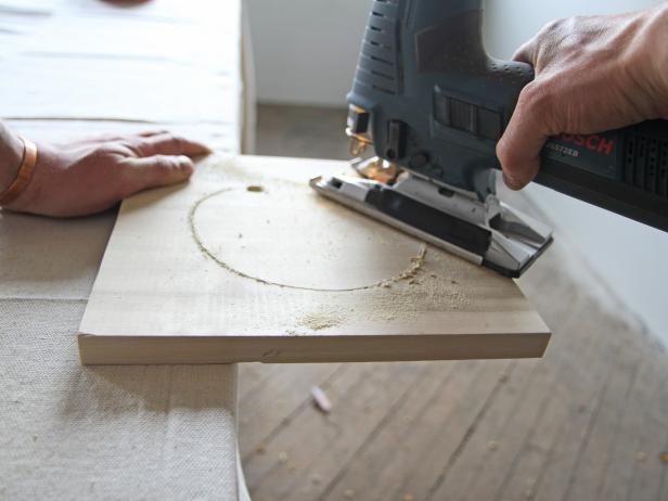 Cut a circle out of a poplar wood piece using a jigsaw.