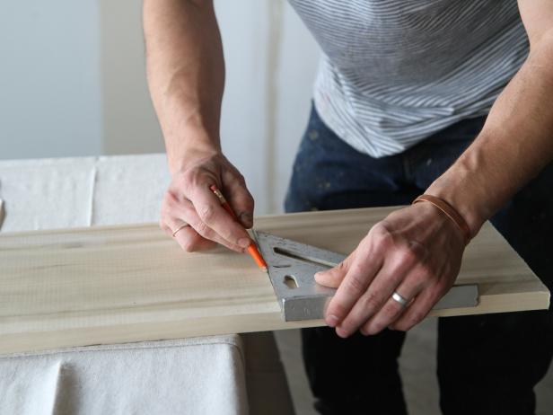 Make a straight line on the 10” mark using a speed square and pencil.