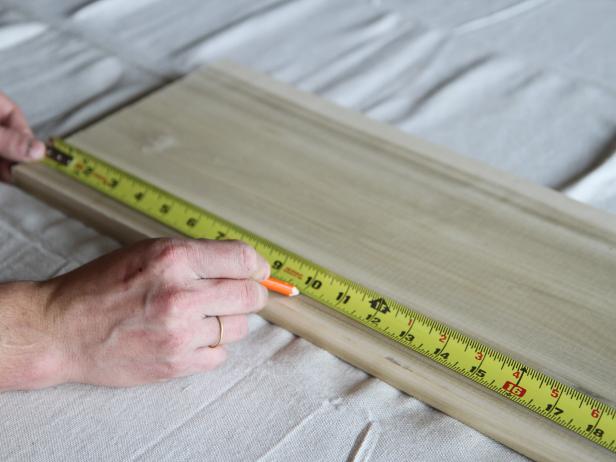 Measure and mark a piece of poplar wood at 10".