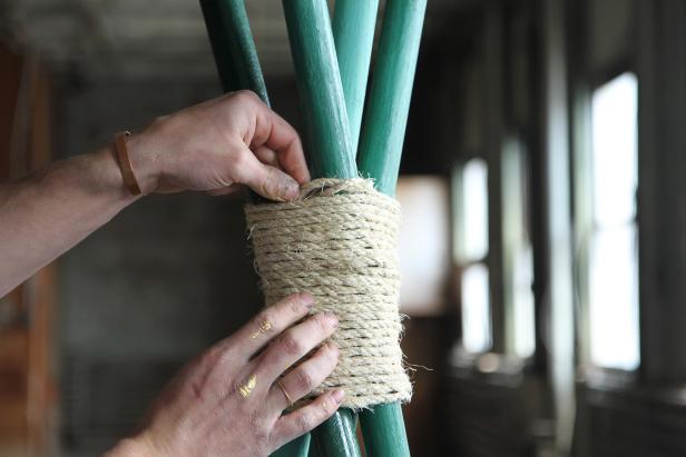 Tuck the end of the twine after you've wrapped the poles.
