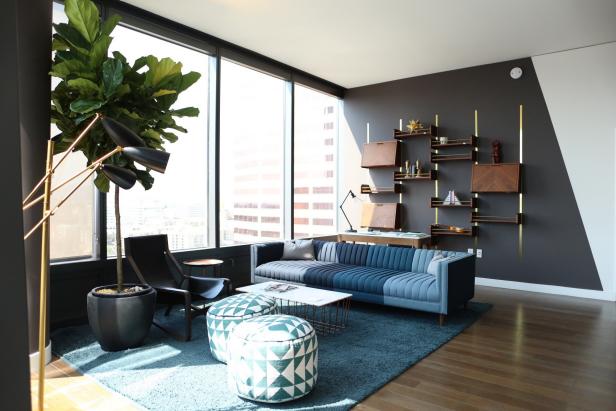 Blue and Gray Midcentury Living Room With Ottomans