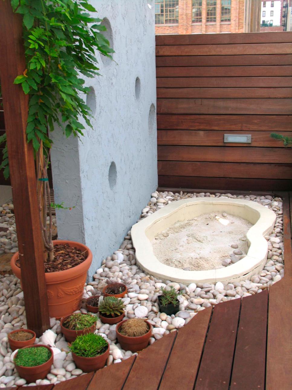 Contemporary Rooftop Terrace Features Potted Plants Potted Plants and Potted Tree in Rock Bed on Rooftop Deck