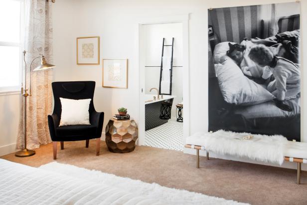 Sitting Area in Master Bedroom with Chair, Bench and Large Black-and-White Photo Sitting Area in Master Bedroom with Chair, Bench and Large Black-and-White Photo