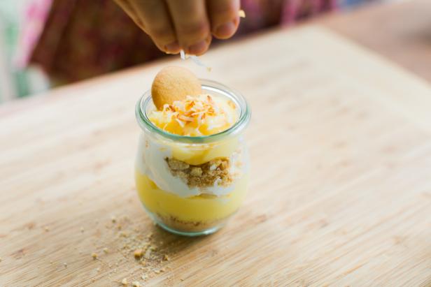 Garnish with a whole wafer and a sprinkle of toasted coconut.