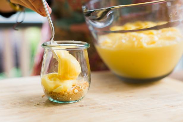 In a medium bowl, whisk together the pudding and milk.