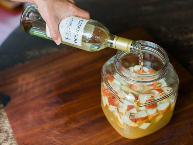 Finally, pour a bottle of wine into pitcher.