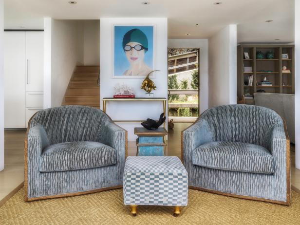 Beach House Sitting Area with Comfortable Chairs and Sunbather Painting Beach House Sitting Area with Comfortable Chairs and Sunbather Painting