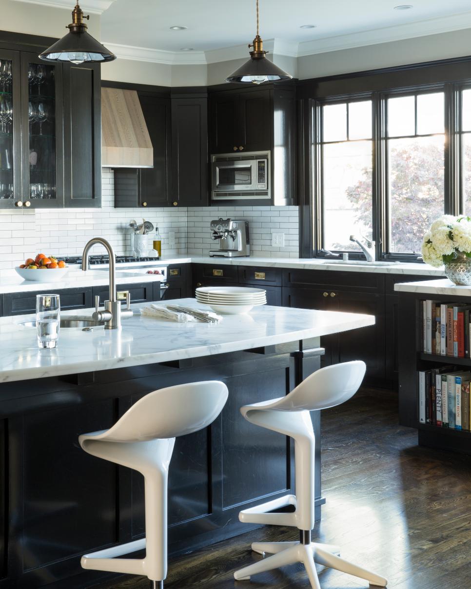 Black And White Transitional Kitchen With Modern Stools Transitional Kitchen With Hardwood Floors And Dark Cabinetry