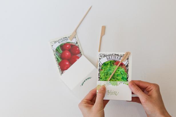 Fasten bamboo stick to tape between seed packet and name card, then place packet at each guests’ seat!