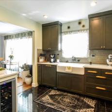 Dark Gray Cabinets with Gold Fixtures Create an Aesthetically Pleasing, Updated Design