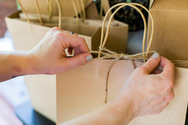 Keep string and scissors handy so guests can secure bags and cartons before leaving