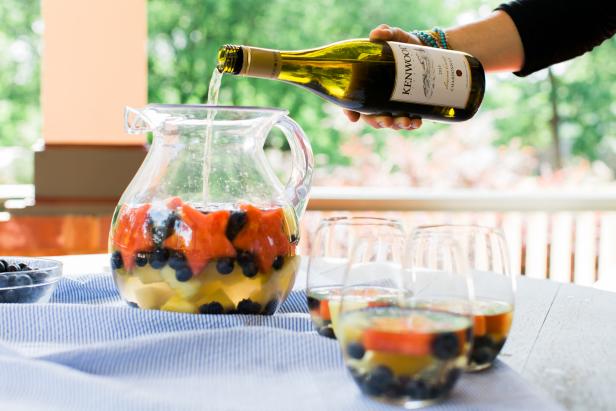 Pour dry white wine over the fruit. Before serving, refrigerate for a couple of hours, allowing the flavors to blend.