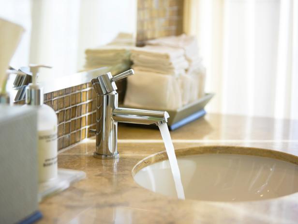 Bathroom Sink With Neutral Countertop and Backsplash Bathroom Sink With Neutral Countertop and Backsplash