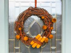 This traditional grapevine wreath with a modern twist is sure to punch up any front entry, no matter what your style.