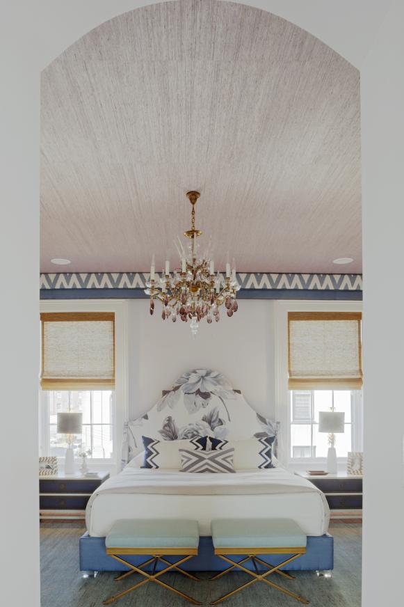 Blue and White Bedroom With Chandelier Bedroom With Chandelier and X-Base Seats
