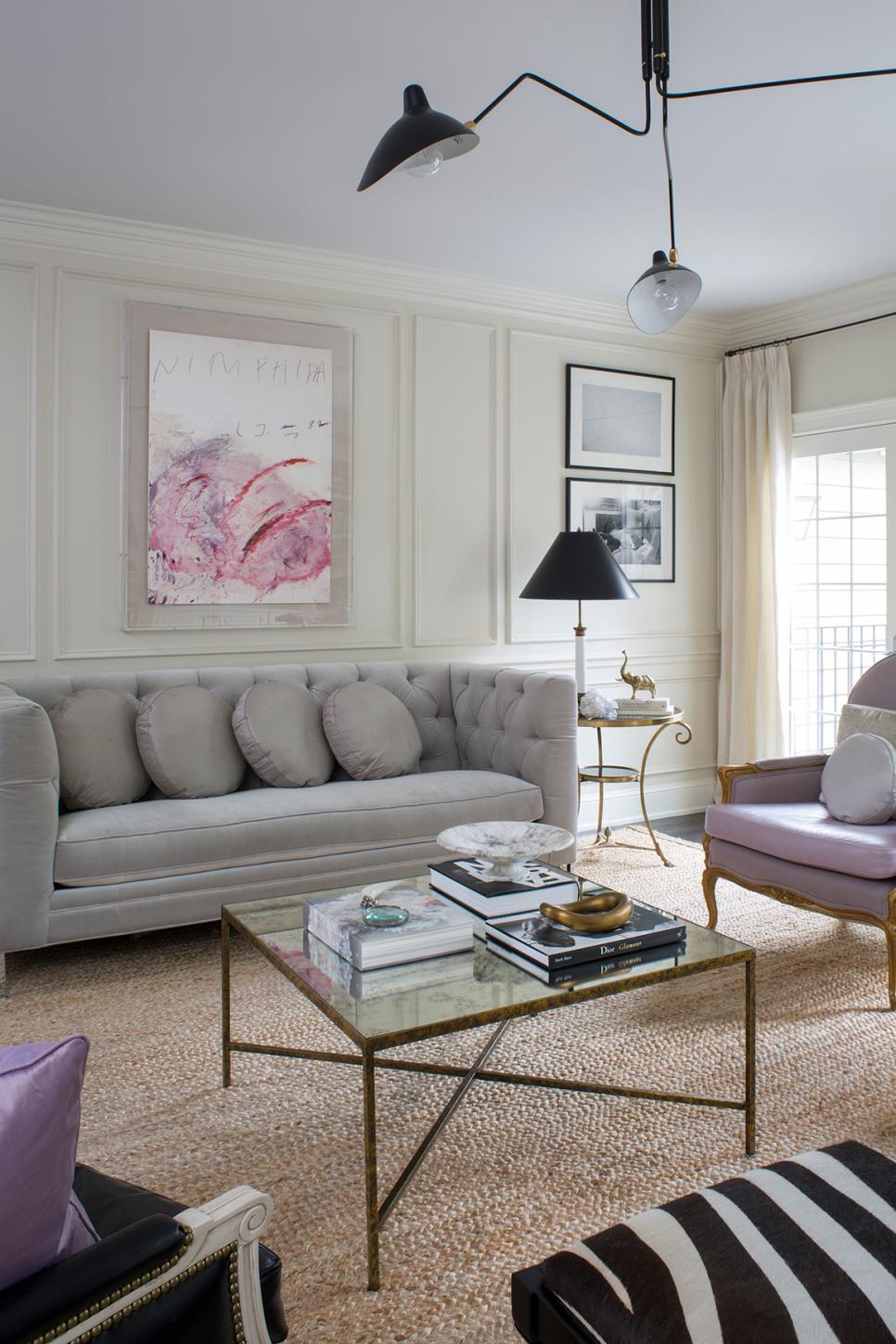 Sophisticated Living Room With a Gray Tufted Sofa & Lavender Accents Neutral Transitional Living Room With Gray Sofa & Light Purple Accents