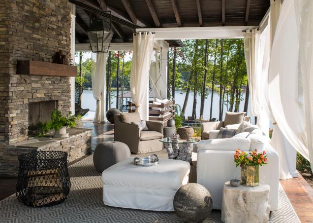 Comfy Outdoor Lounge With Fireplace & Drapery Comfy Outdoor Lounge With Fireplace & Drapery