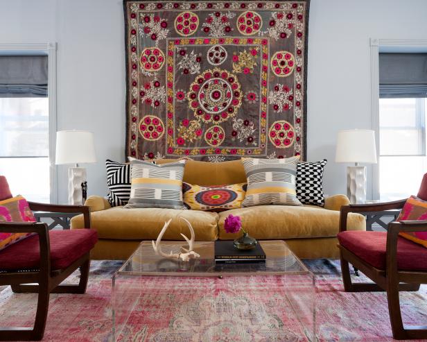 Eclectic Living Room With Mustard Yellow Sofa, Patterned Wall Tapestry and Mixed Decorative Throw Pillows Eclectic Living Room With Mustard Yellow Sofa, Patterned Wall Tapestry and Mixed Decorative Throw Pillows