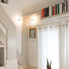 Neutral Staircase and Bookshelf