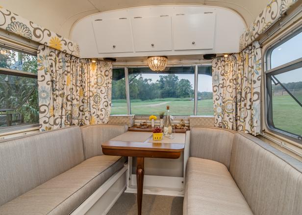 Gray Banquette and Floral Curtains in Avion Trailer Gray Banquette and Floral Curtains in Avion Trailer