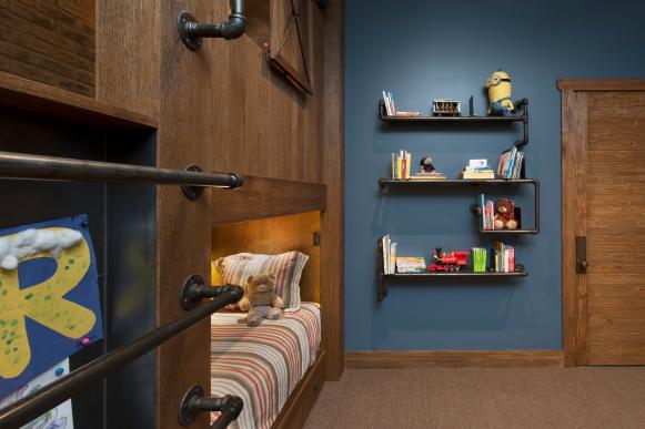 Pipe Bookshelves in Kid's Rustic Blue Room Pipe Bookshelves in Kid's Rustic Blue Room