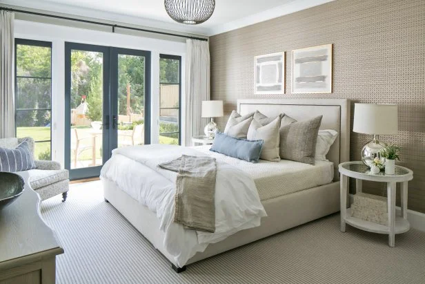 Transitional Bedroom With Graphic Brown Accent Wall and French Doors