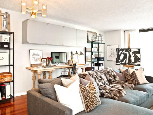 Condo Living Room With Gray Sectional Sofa and Office Area Condo Living Room With Gray Sectional Sofa and Office Area