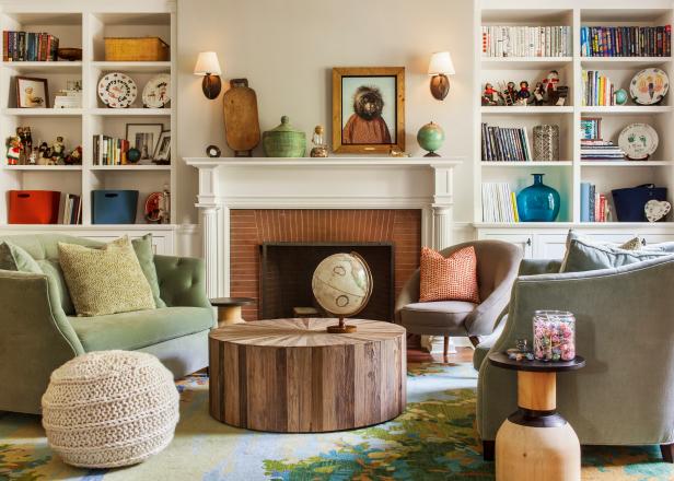 Neutral Living Room Features Fresh Transitional Design Transitional Beige Living Room With Fireplace and White Bookshelves