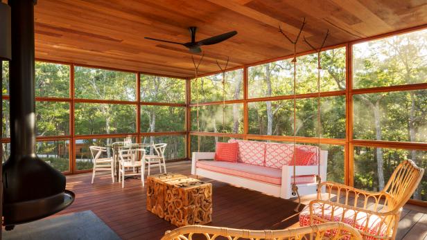 Screened-In Rustic Porch With Porch Swing Screened-In Rustic Porch With Plenty of Seating
