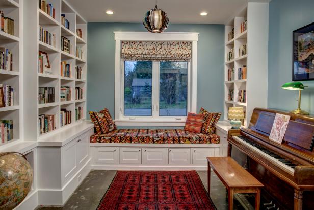Country Reading Room With Full Wall Bookshelves, Leaf Patterned Window Seat and Wood Piano Country Reading Room With Full Wall Bookshelves, Leaf Patterned Window Seat and Wood Piano