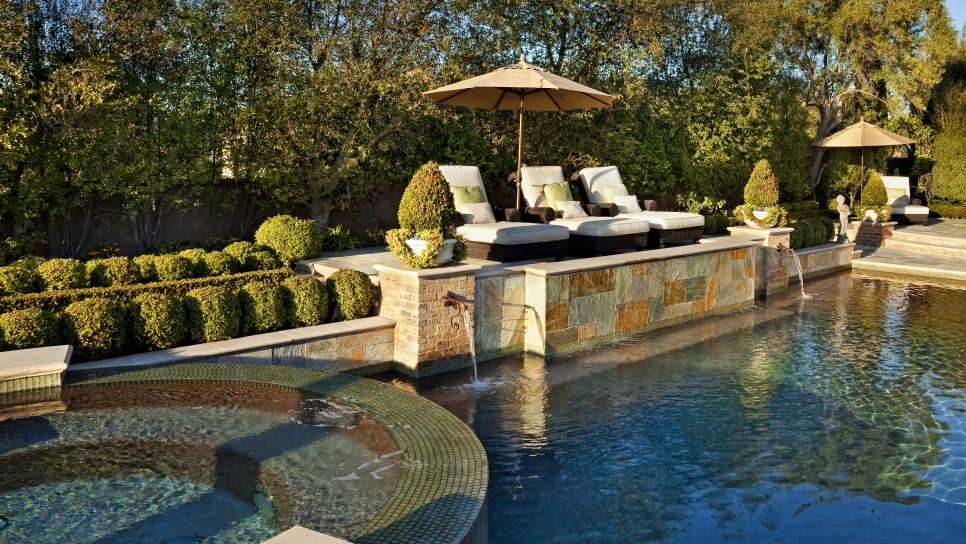 Swimming Pool & Infinity Spa With Raised Lounge Mediterranean Pool & Spa With Neutral Chaises, Fountains & Umbrella