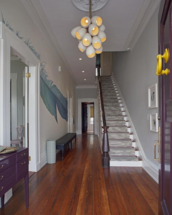 Colorful, Welcoming Foyer Purple Entry Door into Foyer