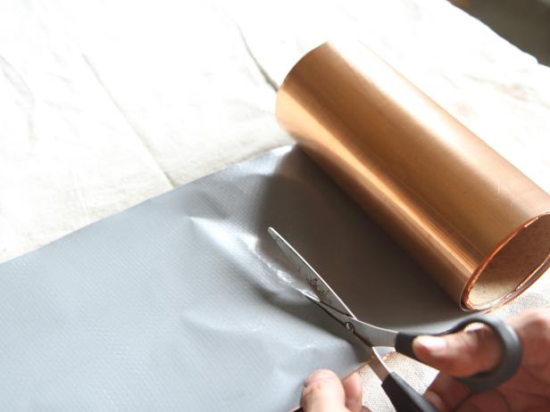 Cut copper flashing at the 8' mark.
