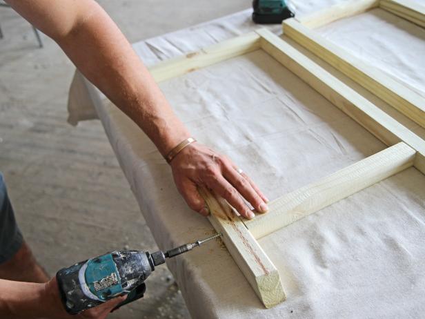 Attach the legs to the cross brace using 2 ½” wood screws.