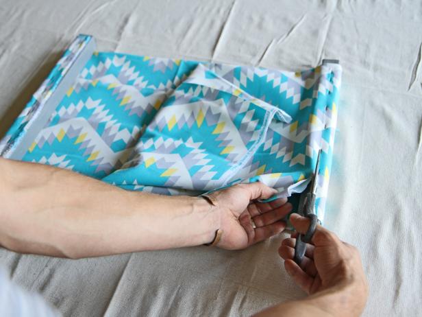 Cut off the excess fabric with scissors.
