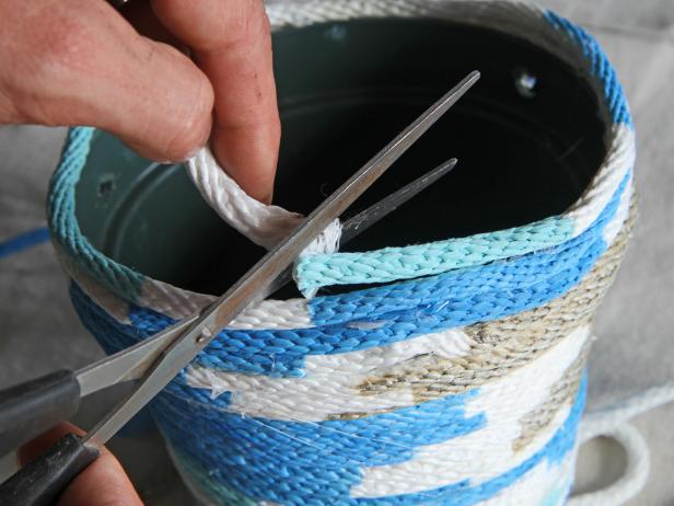 Cut off excess rope once the lip of the pot is completely covered.