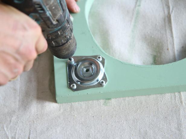 Install table leg angled top plates in each corner on the 1” mark using screws.