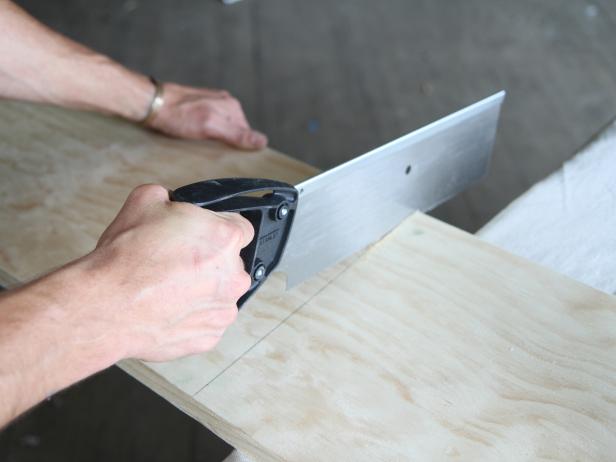 Cut on the line using a wood hand saw.